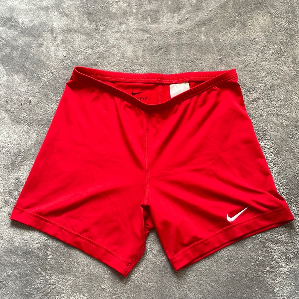 Red Nike compression shorts